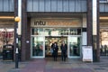 Exterior shot of entrance to the intu Eldon Square shopping centre mall with people leaving Royalty Free Stock Photo