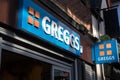 Exterior shot of Greggs Bakers signage on the front of shop