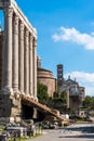 Exterior side view of ancient colonnade of roman temple