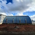 Exterior Side View of Curved Corrugated Metal Building on Mare Island in Vallejo, Ca