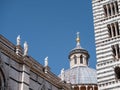 Exterior of Siena Cathedral with copula and bell tower Royalty Free Stock Photo