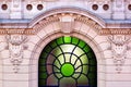 exterior stone elevation detail in the castle district in Budapest. colorful stained window of the Riding Hall Royalty Free Stock Photo