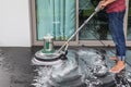 Exterior stone floor cleaning with polishing machine and chemica Royalty Free Stock Photo