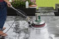 Exterior stone floor cleaning with polishing machine and chemica Royalty Free Stock Photo