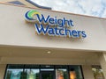 The exterior storefront of a Weight Watchers franchise in Springfield, IL
