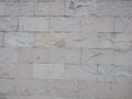 Exterior textured stone wall. slices of stone wall like as a brick wall pattern