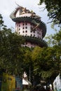 Exterior tower building with king of serpent naga and chinese dragon for thai people travel visit respect praying of Wat Samphran