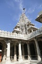 Exterior towers and columns of  Chaturmukha Dharana Vihara   Jain temple Royalty Free Stock Photo