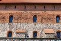 Exterior of the Trakai castle old brick wall with a windows in Trakai, Lithuania. Royalty Free Stock Photo