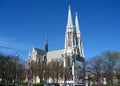 Exterior of Vienna`s Votivkirche with two white towers, Austria