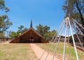 Exterior view of the Bethlehem Lutheran Church with people in Hermannsburg outback Australia Royalty Free Stock Photo