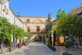 Exterior view of buildings in Plaza de Arco, Caravaca de la Cruz, Spain, on a sunny day