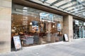 Exterior view of Caffe Nero coffee shop showing signage and logo.  Glass window display and entrance Royalty Free Stock Photo