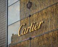 Exterior view of a Cartier store and company logo in the huge luxurious mall