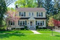 Exterior view of charming colonial two story home in suburban ne Royalty Free Stock Photo