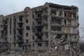 An exterior view of a high-rise residential building heavily damaged by after the bombing in Izium (Izyum