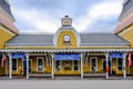 Exterior view of a historic, timber-built railroad station.