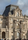 Exterior view of The historical palace building during day time at the Louvre museum Royalty Free Stock Photo