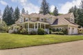 Large country home with wrap-around deck.