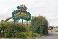 Exterior view of Lost World Adventure Golf, with dinosaur, near Long Sands beach, in Tynemouth, UK