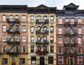 Exterior view of old brick apartment buildings in the East Village neighborhood of New York City