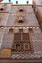 Exterior view of old houses in Rosetta made of colored bricks and wooden arabesque windows