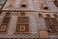 Exterior view of old houses in Rosetta made of colored bricks and wooden arabesque windows