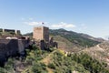 Exterior view of part of the wall and tower of the medieval castle of Lorca Murcia Spain, located on top of a hill with privileged