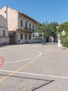 Exterior view of public school building with playground