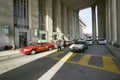 Exterior view of red taxi cab in front of the 30th Street Station, a national Register of Historic Places, AMTRAK Train Station i