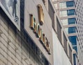 Exterior view of a Rolex store and company logo in the huge luxurious mall