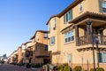 Exterior view of a row of identical townhouses; Sunnyvale, San Francisco bay area, California