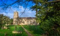 Exterior view of St Michael and All Angels` Church and grave yard in Melksham, Witlshire, UK