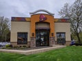 Exterior view of a Taco Bell fast food restaurant while the dining room is closed due to COVID-19 Royalty Free Stock Photo