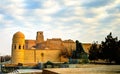 Exterior view to Ota-Darvoza gate and Statue of Muhammad ibn Musa al-Khwarizmi, Khiva, Uzbekistan