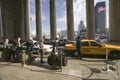 Exterior view of yellow taxi cab in front of the 30th Street Station, a national Register of Historic Places, AMTRAK Train Statio