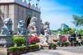 Exterior of Viharn Sien Temple with Buddhist statues and sculptures