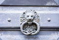 Exterior vintage door knocker metal circle on a door of an ancient building in Catania, Sicily, Italy Royalty Free Stock Photo
