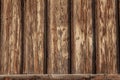 Exterior wall background with board and batten wood, heavily weathered, peeling and cracked paint