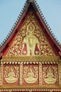 Exterior wall gold painted decoration of the Haw Phra Kaew building in Vientiane, Laos.