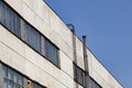 Exterior wall of an old industrial building against blue sky. Royalty Free Stock Photo