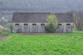 Exterior wall of old worn barn doors Royalty Free Stock Photo