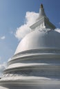 Exterior of the white painted stupa at Isurumuniya rock temple in Anuradhapura, Sri Lanka. Royalty Free Stock Photo