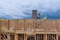 Exterior with wood framing beam of new house under construction beam wood of elevator shaft for concrete block building