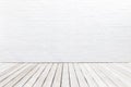 Exterior wooden decking floor and white brick wall. Abstract dec