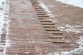 Exterior wooden decking or flooring covered with snow Royalty Free Stock Photo