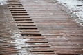 Exterior wooden decking or flooring covered with snow Royalty Free Stock Photo