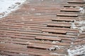 Exterior wooden decking or flooring covered with snow Royalty Free Stock Photo