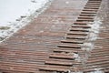 Exterior wooden decking or flooring covered with snow Royalty Free Stock Photo