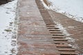 Exterior wooden decking or flooring covered with snow Royalty Free Stock Photo